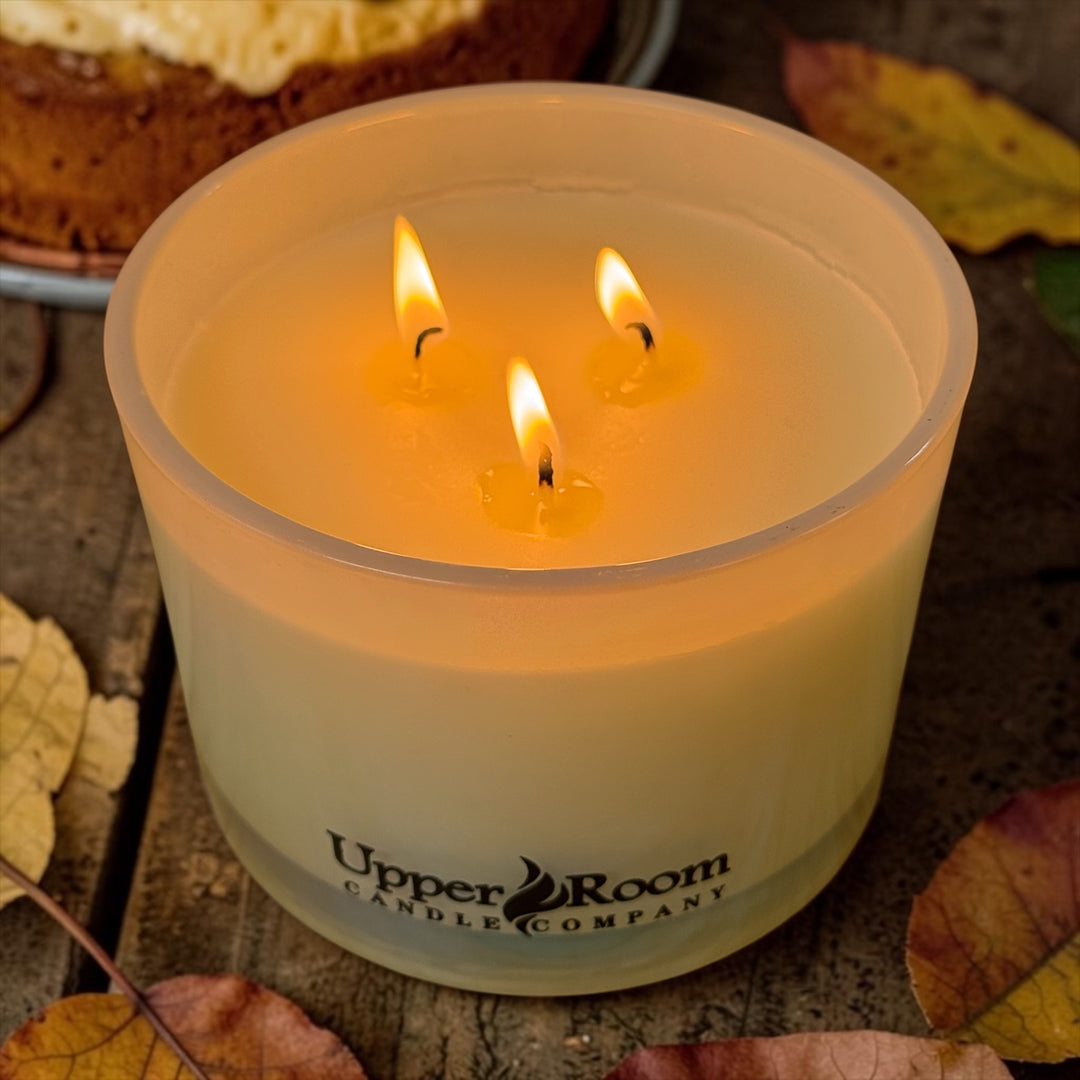 Butternut Souffle hand-poured candle in a triple wick white pearl jar with brown sugar, pumpkin, molasses, cinnamon and vanilla—cozy bakery scent infused with nutmeg oils.