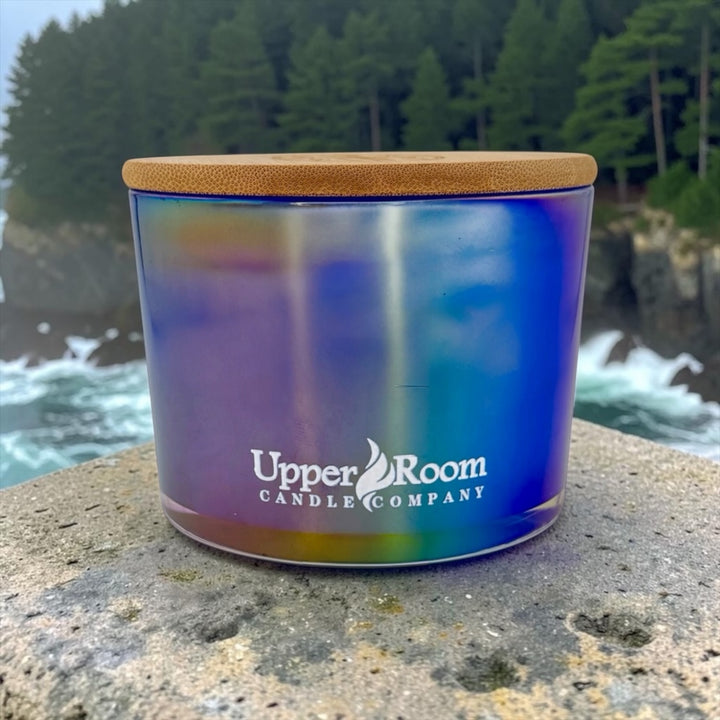 Fierce Forest hand-poured soy wax blend candle by Upper Room Candle Company in an amber jar with black lid, featuring oakmoss, citrus and marine accord for a bold, fresh, masculine scent.