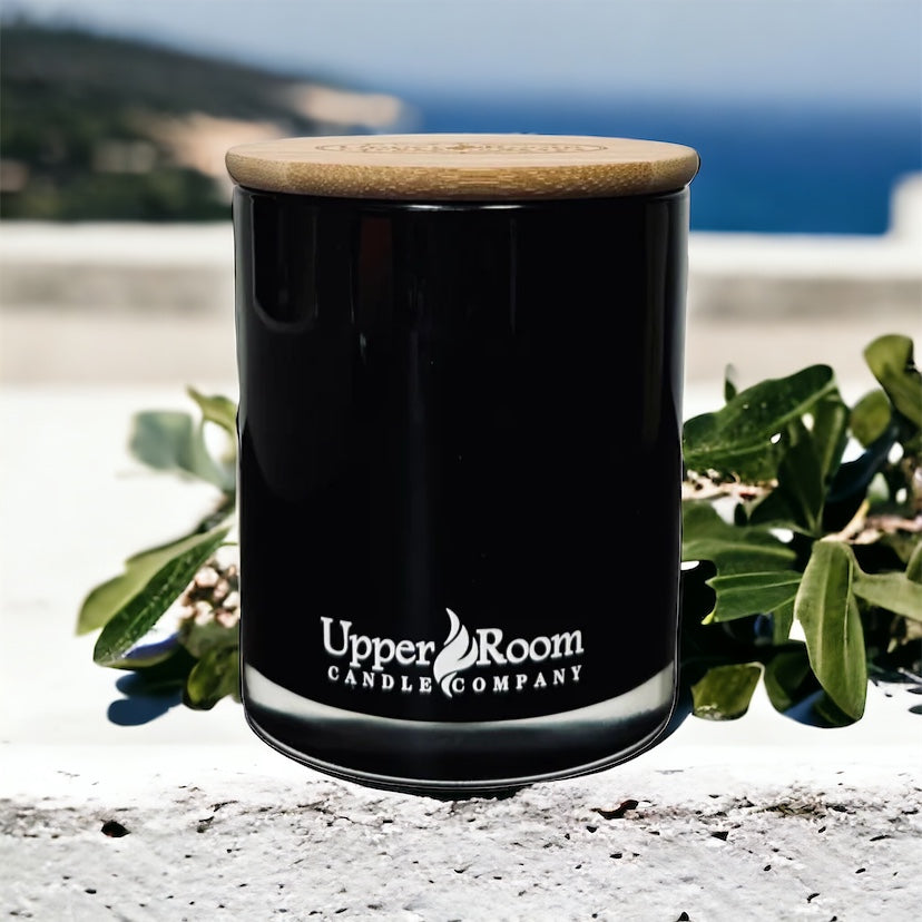 Mediterranean Sandalwood Candle in a double wick black jar from upper room candle company