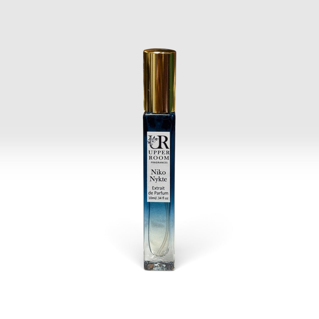 Niko Nykte extrait de parfum 10ml by Upper Room Fragrances in a square blue glass bottle with black cap, featuring a fresh masculine scent of mint, green apple, Italian lemon, cedarwood, vetiver and oakmoss.