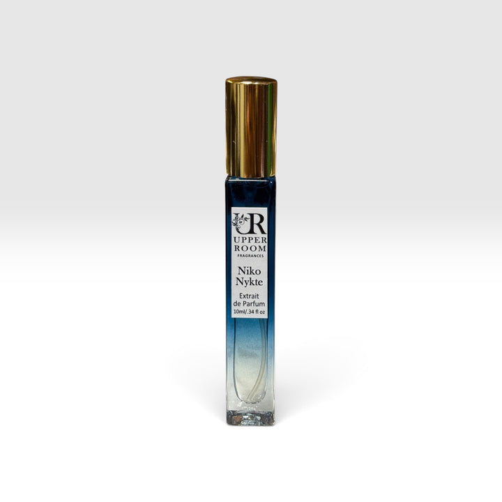 Niko Nykte extrait de parfum 10ml by Upper Room Fragrances in a square blue glass bottle with black cap, featuring a fresh masculine scent of mint, green apple, Italian lemon, cedarwood, vetiver and oakmoss.