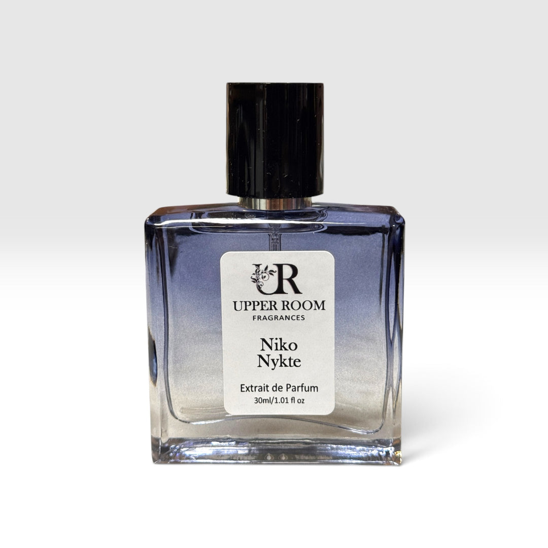 Niko Nykte extrait de parfum 30ml by Upper Room Fragrances in a square blue glass bottle with black cap, featuring a fresh masculine scent of mint, green apple, Italian lemon, cedarwood, vetiver and oakmoss.