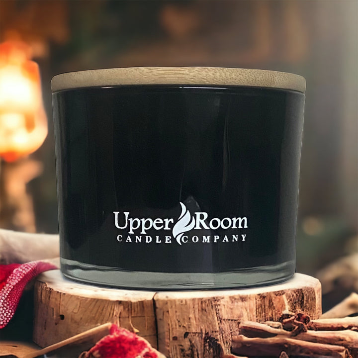 Plaid & Pipe candle in a triple wick black jar from upper room candle company