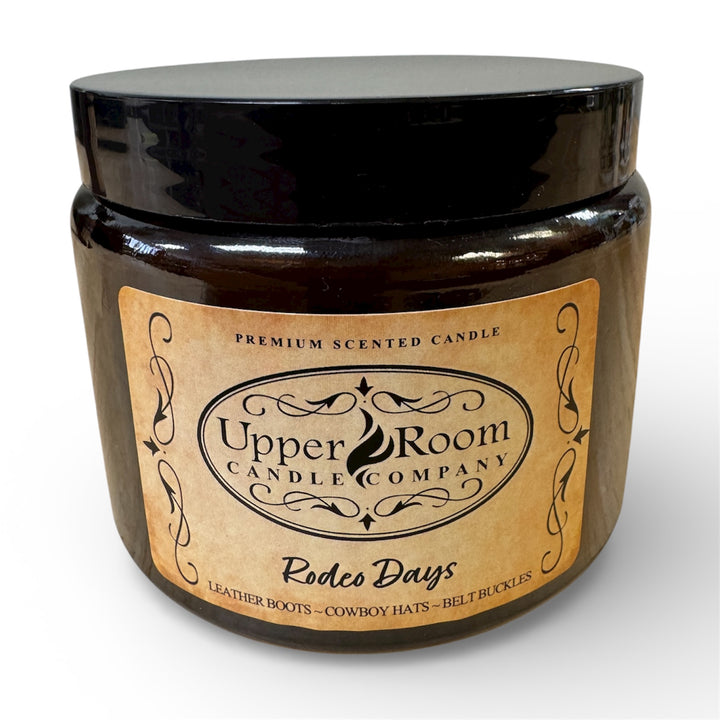Rodeo days candle in a double wick amber jar from upper room candle company 