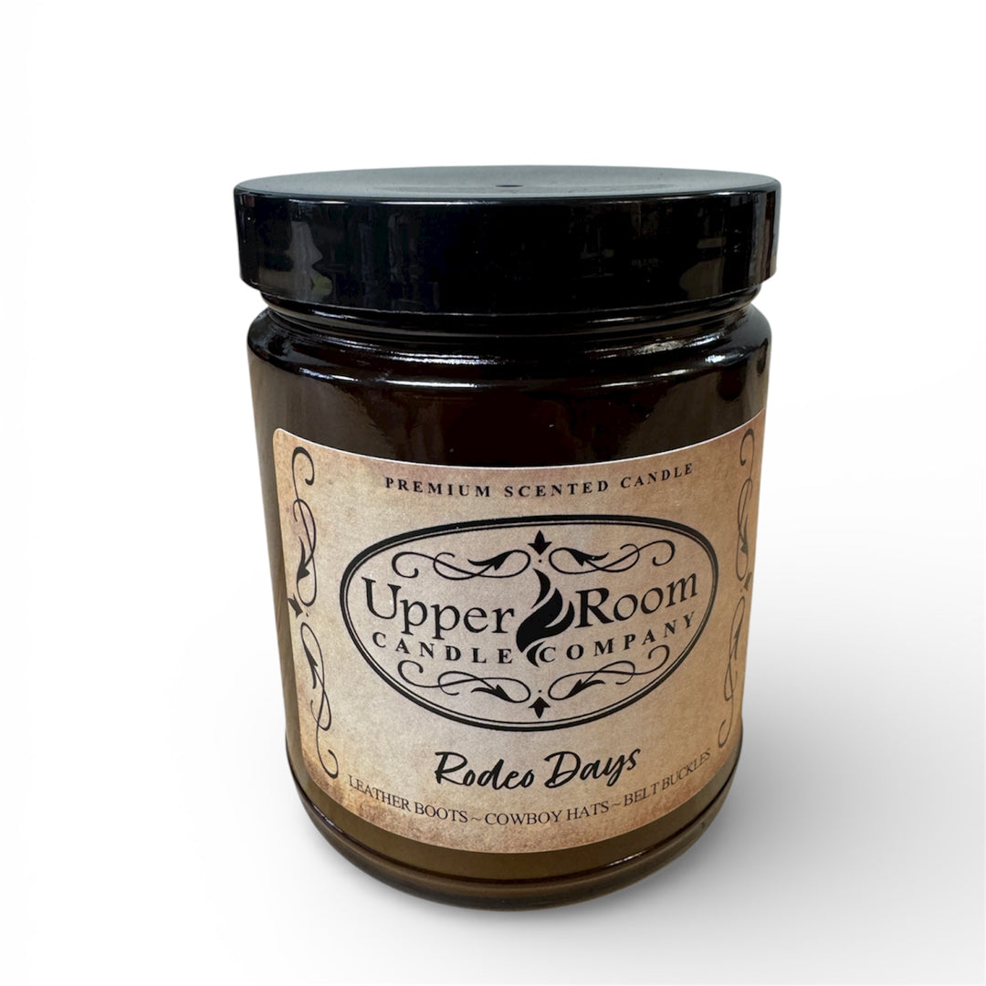 Rodeo days candle in a single wick amber jar from upper room candle company 