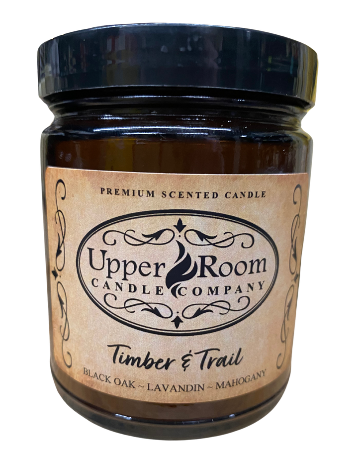 Timber & Trail candle in a single wick amber jar from upper room candle company