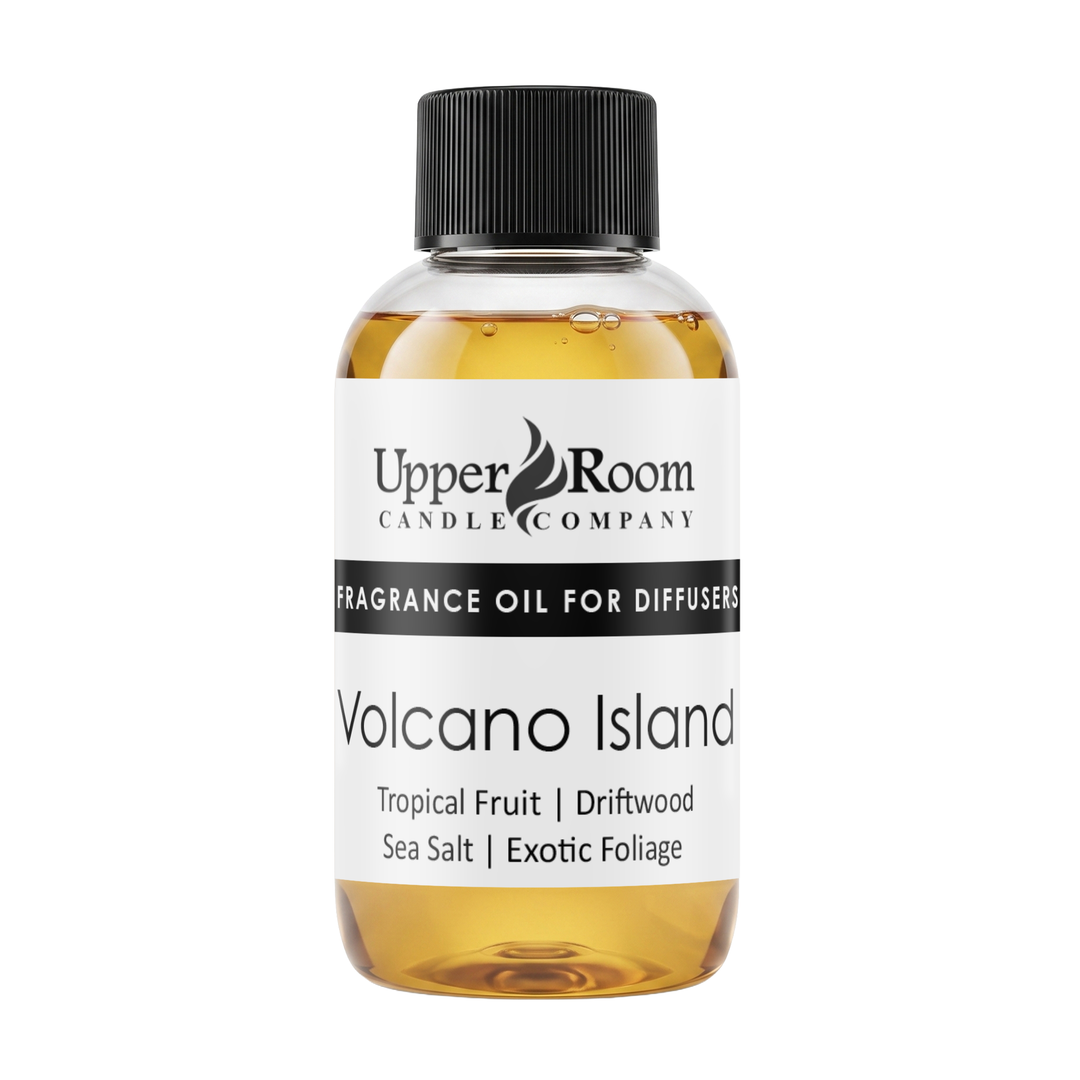 A bottle of Upper Room Candle Company Volcano Island fragrance oil for diffusers, featuring amber-colored liquid in a clear bottle with a black cap and a white label.